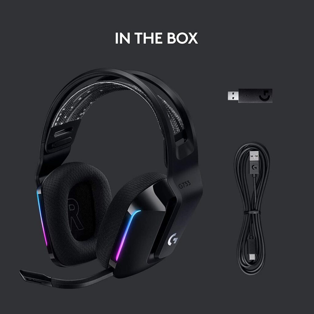 Logitech G733 wireless gaming headset in black with USB receiver and charging cable included in the box.